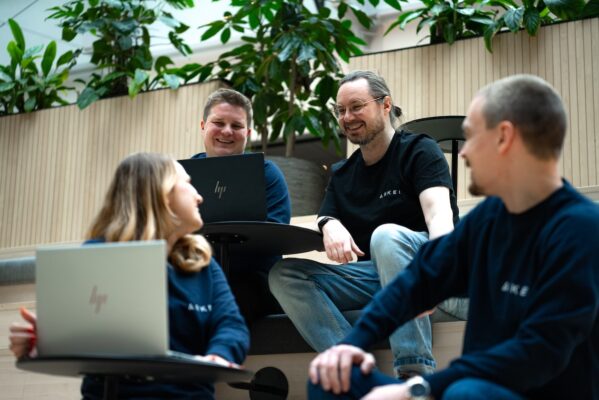 four arked employees chatting